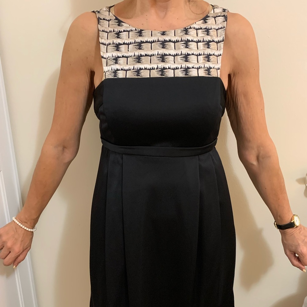 Pollini Black cocktail dress with gold threaded chest and back. Italian couture.